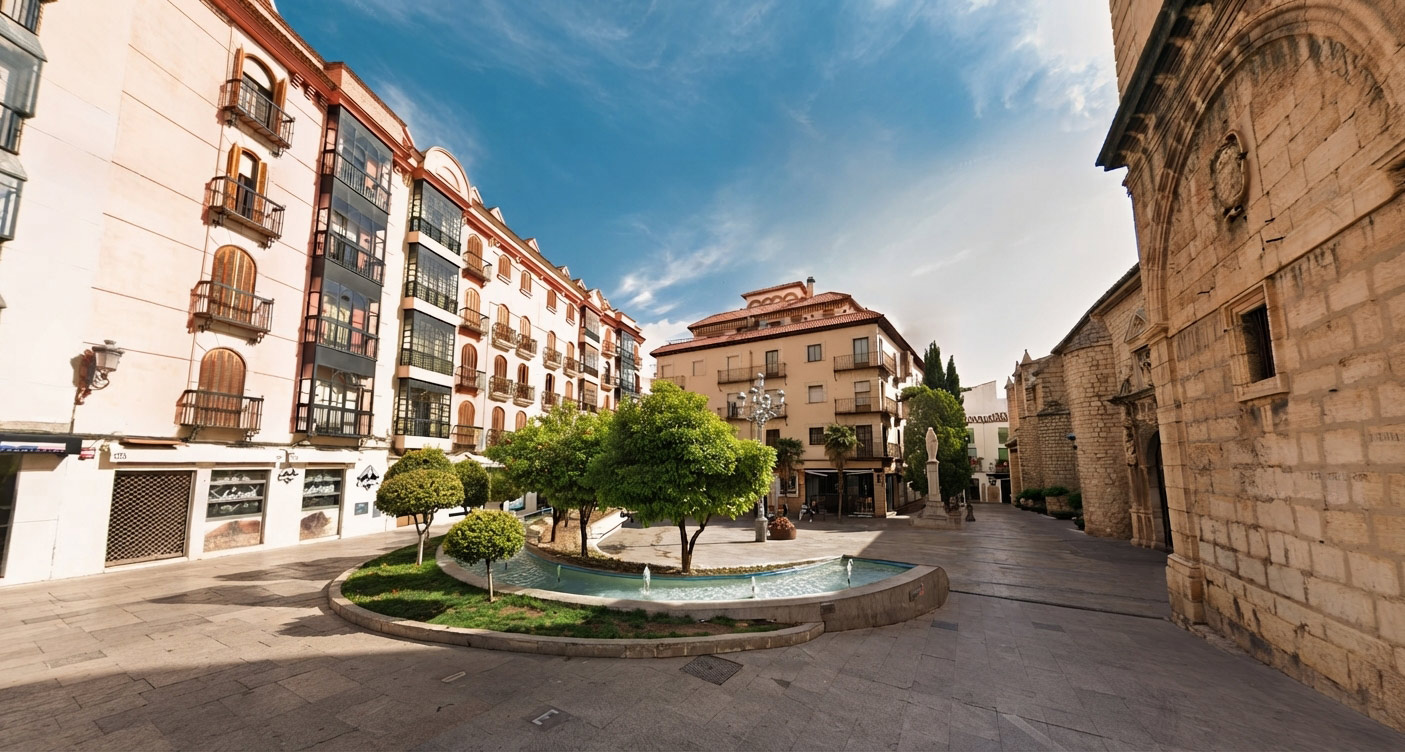 Barrio del Realejo en Granada, casas con abundantes macetas y flores.